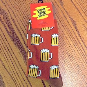 Brown yellow and white beer socks. “One size fits most” never worn. Brand New.